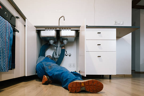 Professional Emergency Plumber technician working in Grandville, MI